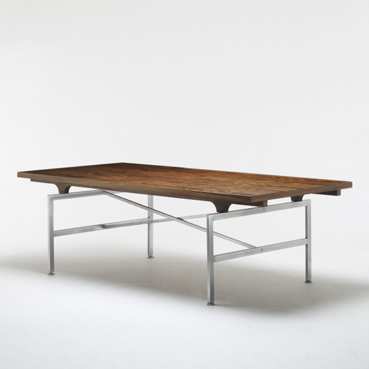 Illum Wikkelso desk for P. Schultz and Co., Denmark, circa 1960, rosewood, matte chrome-plated steel, 86 1/2 inches wide x 39 1/4 inches deep x 27 inches high. Estimate: $5,000-$7,000. Image courtesy of Wright.