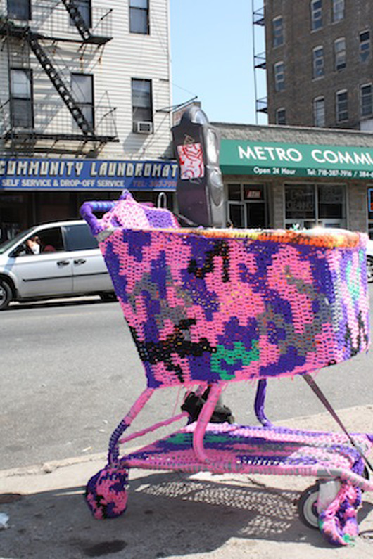  Even before entering the store, a yarn-covered shopping cart by crochet-enthusiast Olek welcomes visitors. Photo by Kelsey Savage Hays.