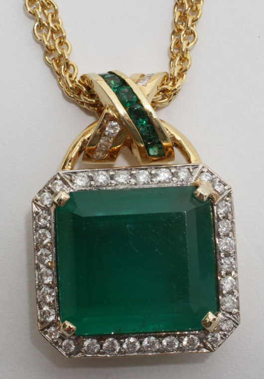 Emerald (28.60 carats) and diamond (1.85 carats) pendant, 14kt yellow gold. Estimate: $13,000-$15,000. Image courtesy of DuMouchelles.