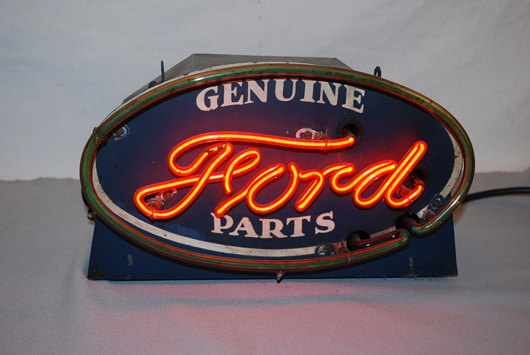 Ford Genuine Parts single-sided tin counter-top, or hanging display, neon sign: $6,050. Image courtesy of Matthews Auctions LLC.