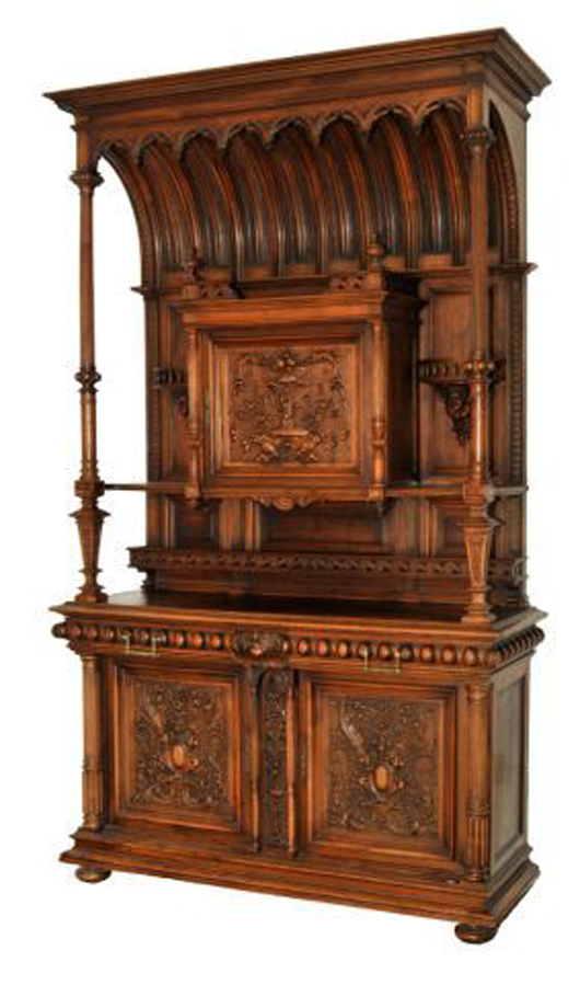 Monumental German heavily carved walnut and oak buffet, late 19th/early 20th century, 112 1/4 inches high, 66 1/4 inches wide, 23 1/2 inches deep. Estimate: $10,000-$12,000. Image courtesy of Gray’s Auctioneers.