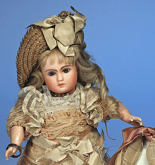Petite Steiner bebe with ‘Au Nain Bleu’ shop label, 10½ inches, $3,920. Image by Frasher’s Doll Auctions.
