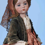 Top lot of the sale, French circa-1914 bisque doll created by sculptor Albert Marque, 22 inches, signed and incised with the number ‘12,’ $168,000. Image by Frasher’s Doll Auctions.