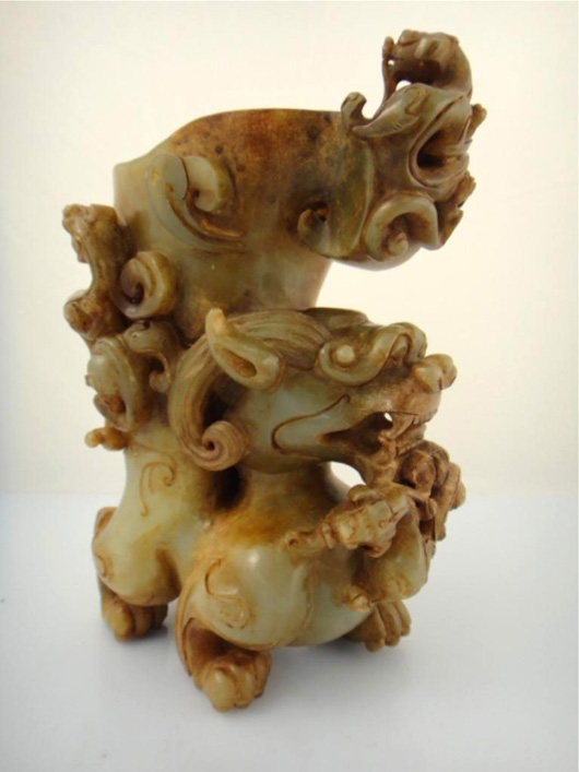 The finely detailed Ming Dynasty jade brushpot is adorned with two dragons ‘climbing’ the lion, and its remarkable carved form is in the shape of a lion. As a dynastic jade brushpot, standing at 8 inches tall, it carries a high estimate of $20,000. Image courtesy of 888 Auctions.