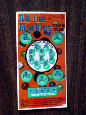 Members of the Global Lottery Collector's Society look primarily for scratch-off tickets, like this 2002 ticket from Connecticut. The used $7 ticket—not a winner—resold sold for $1. Image courtesy of LiveAuctioneers.com Archive and Block’s Marble Auctions.