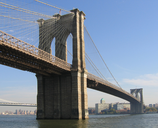 The Brooklyn Bridge and downtown Brooklyn. Image by Postdlof. This file is licensed under the Creative Commons Attribution-Share Alike 3.0 Unported license.