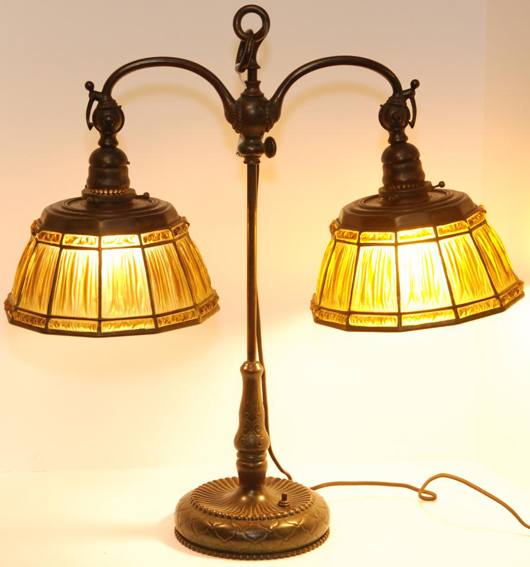 Stunning Tiffany linenfold double-shade student desk lamp, marked (est. $15,000-$20,000). Image courtesy of Elite Decorative Arts.