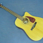 Fender acoustic guitar. Image courtesy of LiveAuctioneers.com and William J. Jenack Auctioneers.