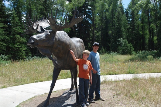 The new moose sculpture is popular with children and has become an obligatory 'photo op' for visitors to the park. Image courtesy of Grand Teton National Park Foundation.