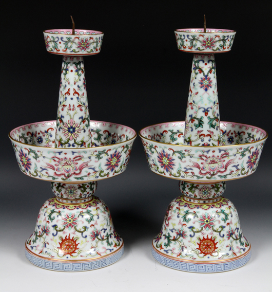 Pair of Famille Rose candle holders, China, 19th century, possibly of Jaiqing Period (1735-1820. Estimate: $12,000-$18,000. Image courtesy of Kaminski Auctions. 