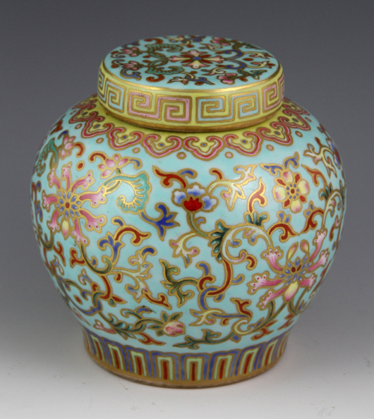 Famille Rose jar, Qianlong period (1735-1796), decorated with lotus scrolls, 4 1/4 inches high x 3 7/8 inches diameter, in custom felt-lined box. Estimate: $25,000-$50,000. Image courtesy of Kaminski Auctions. 