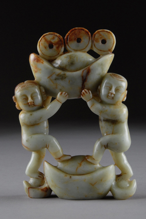 Chinese carved jadeite figural group, $400-$600. Langley Scott image.