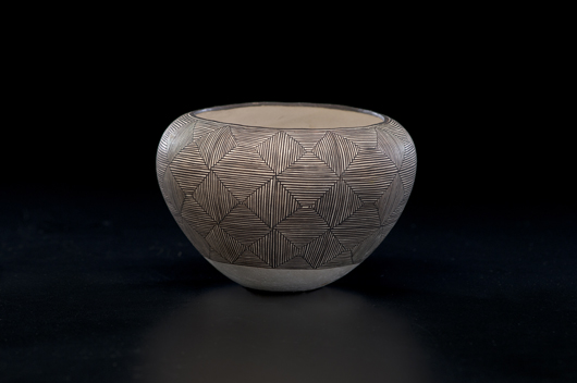 Work by creative 20th century pueblo potters is also highly collectible. Carrying a $600-800 estimate in the September Cowan’s sale, this signed vase by Acoma matriarch Lucy M. Lewis is covered with a complex calligraphic pattern. Courtesy Cowan’s Auctions.