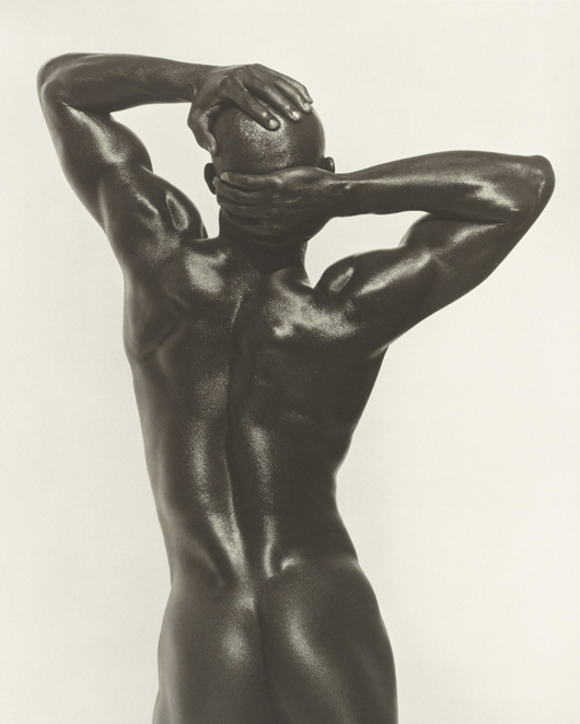 Herb Ritts (American, 1952 - 2002), Djimon Three-Quarter Nude (Back View), Hollywood, 1989, Platinum print, Dimensions: Image: 71.1 x 55.9 cm (28 x 22 in.), Framed: 76.2 x 86.4 cm (30 x 34 in.), Accession No. 2011.19.18, Copyright: © Herb Ritts Foundation, Credit: The J. Paul Getty Museum, Los Angeles, © Herb Ritts Foundation.