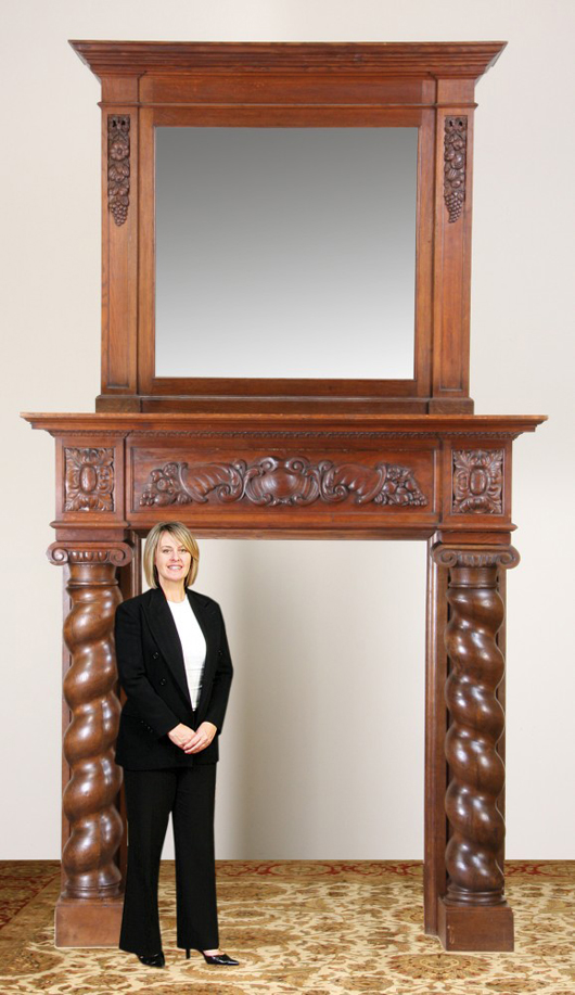 Monumental 19th-century carved oak fireplace mantel, with mirrored overmantel, 130 inches high. Image courtesy of Great Gatsby’s.
