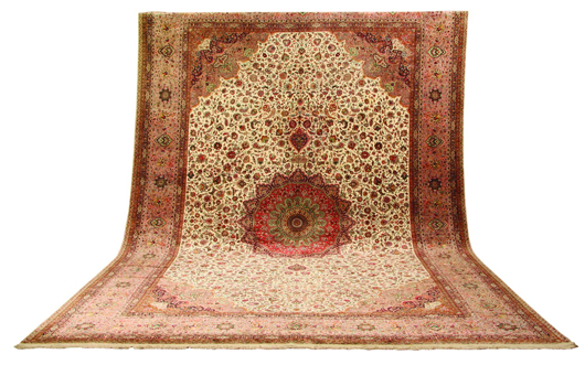 A grouping of finely woven, 100 percent silk Persian rugs, like this massive Tabriz, will be sold. Image courtesy of Great Gatsby’s.