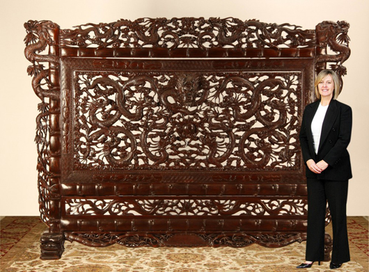 Massive 19th-century pierce carved rosewood center-of-the-room divider, 101 inches tall by 75 inches wide. Image courtesy of Great Gatsby’s.