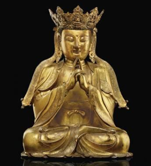 Rare, finely cast gilt-bronze figure of Vairocana, Ming dynasty, 16th century, 20 1/4 inches high. Estimate: $600,000-$800,000. Image courtesy of Christie’s New York.