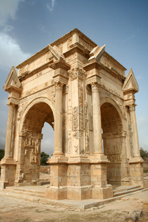 The Arch of Septimius Severus at Leptis Magna, Libya, which was a prominent city of the Roman Empire. Photo by David Gunn.
