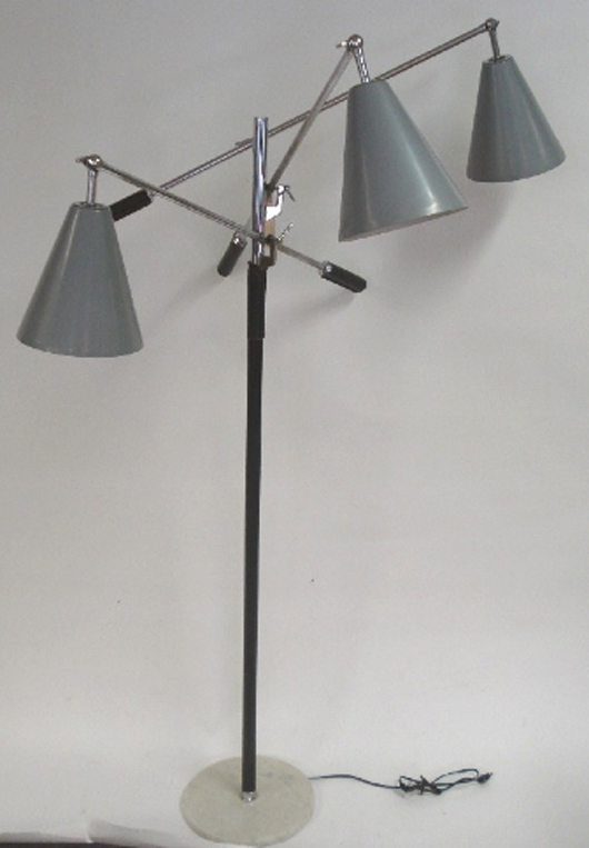 Trienale floor lamp designed by Gino Sarfatti, circa 1950, 71 inches by 41 1/2 inches. Estimate: $1,200-$1,800. Image courtesy of Roland Auctions.