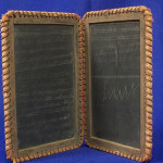 The double slate used by pupils in the early 1900s is the old-school version of today’s laptop. Image courtesy of LiveAuctioneers Archive and Williams Auction and Appraisal Service.