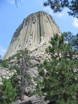 Devils Tower in northeastern Wyoming rises 1,267 feet above the surrounding terrain. The monolithic rock formation was the first declared U.S. National Monument, established on Sept. 24, 1906, by President Theodore Roosevelt. Image courtesy of Wikimedia Commons.