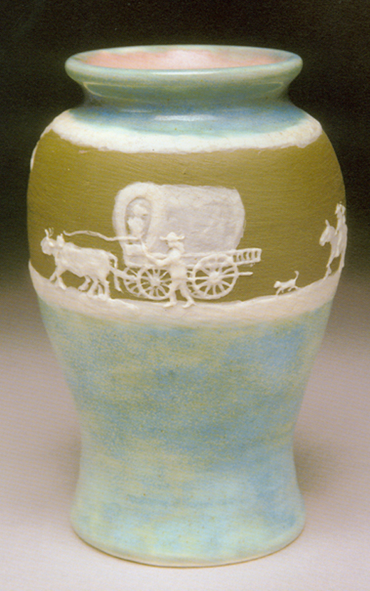 From his earliest days as a potter, Stephen used the difficult pate-sur-pate technique to create scenes of prairie life. He often used a covered wagon motif, which recalled his boyhood journey from Iowa to Nebraska in the late 1800s. Image courtesy of Memphis Brooks Museum of Art