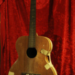 Elvis Presley’s first guitar, a gift on his 11th birthday, January 1946. Est. $350,000-$500,000. Guernsey’s image.