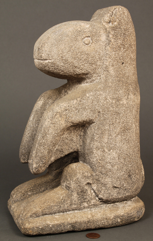 'Varmint,' a carved limestone sculpture by the important African American artist William Edmondson, acquired directly from the artist, is estimated at $20,000-$30,000. An Edmondson birdbath is also being offered. Image courtesy Case Antiques Auction.