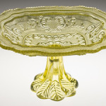 Lacy Princess Feather Medallion and Basket of Flowers compote in brilliant canary yellow. Boston & Sandwich Glass Co. 1840-1845. Estimate: $5,000-$8,000.