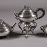 Georg Jensen silver partial tea service comprised of a teapot, tea kettle and covered sugar. Est. $8,000-$12,000. Image courtesy of Stefek's.