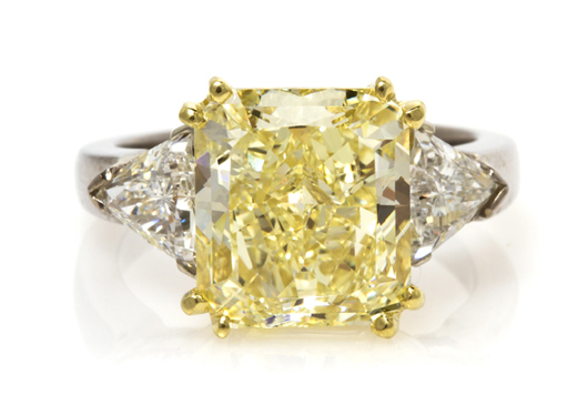 An 18K gold, fancy color yellow and white diamond ring sold for $53,680. Image courtesy of Leslie Hindman Auctioneers.
