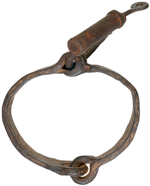 An iron collar and lock are haunting reminders of America’s role in the slave trade. Image courtesy of LiveAuctioneers Archive and Early American History Auctions.