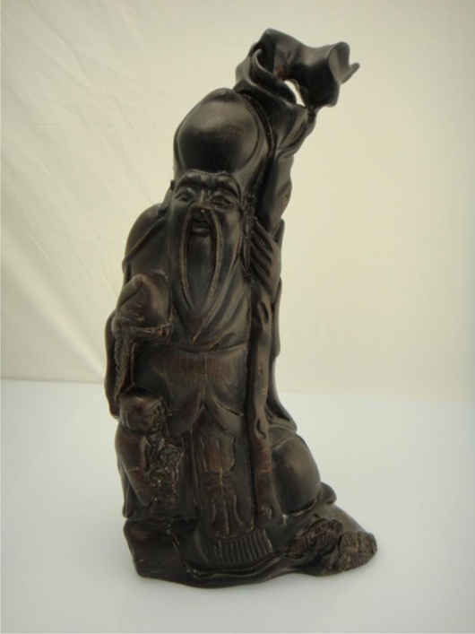 Chinese carved rhinoceros-horn figure of Immortal and Boy, $4,598. 888 Auctions image.