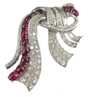 Mauboussin ruby and diamond brooch, est. $5,000-$8,000. Peachtree & Bennett image.