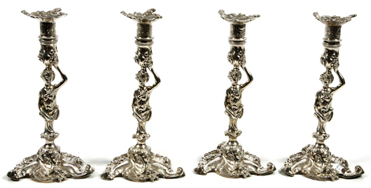 Important set of four Irish cast silver figural table candlesticks by John Walker, Dublin, circa. 1773, 11 1/2 inches tall, 101ounces. Image courtesy of Mealy’s Fine Art.