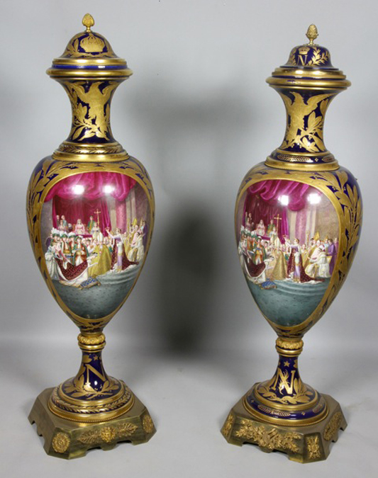 Pair of 19th C. Napoleon III Sevres urns with exceptional paintings on sides, each urn is signed, 63 x 17 in. Kaminski's image.