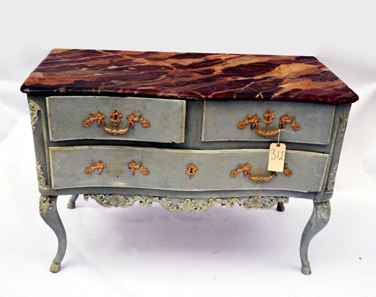 Antique painted and carved serpentine three-drawer commode, expected to realize in the vicinity of $4,500. Roland Auctions image.