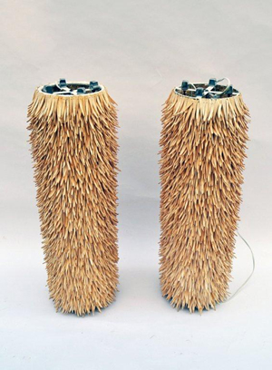 Unique pair of porcupine (or 'feathered' wood) floor lamps, estimated to make $800 or more.