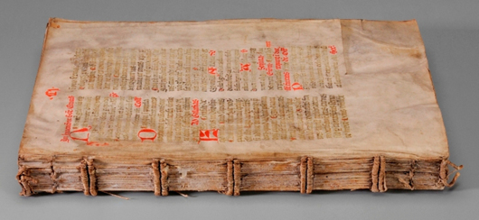Eighty-nine pages from this 15th century German illuminated manuscript were sewn together to form a codex. Black ink was used for the text with red and blue ink for titles and headings. It sold for $21,600 on a $1,000/$2,000 estimate. Image courtesy of Brunk Auctions.