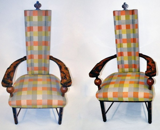 A pair of whimsical German Art Deco high-back chairs with curved arms, ball decorations and finial, found a buyer for $2,400. Image courtesy of Roland Auctions.
