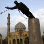 The statue of Saddam Hussein being toppled in Baghdad after the U.S. Invasion of Iraq. Image courtesy of Wikimedia Commons.