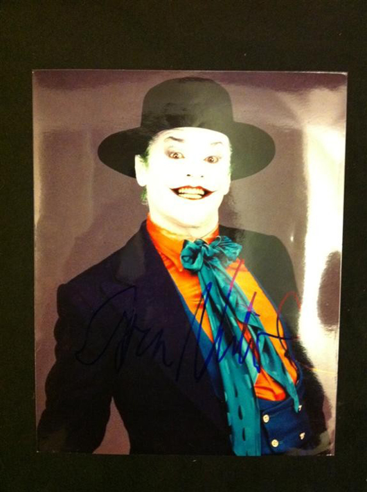 8 x 10 color photo of Jack Nicholson as The Joker in 'Batman,' signed by the actor in blue felt pen. Image courtesy of LiveAuctioneers.com and Premiere Props.   