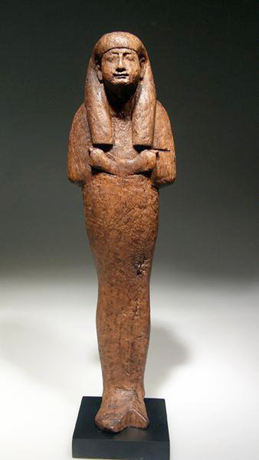 Egyptian New Kingdom wood shabti, wood, late 18th dynasty (circa 1300 B.C.), relatively early and rare, especially in this quality. Estimate $12,000-$15,000.