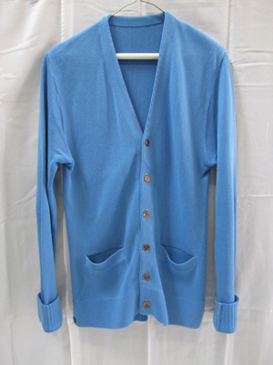 Jack Kevorkian’s signature blue cardigan sweater. Image courtesy of Hutter Auction Galleries.