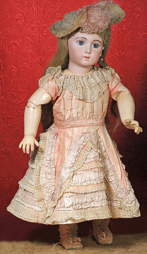 Magnificent 29-inch size 13 'Triste bebe' by Jumeau with luminous complexion. Image courtesy Frasher's Doll Auctions.