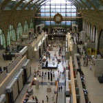A gallery at the Orsay Museum, which is housed in a former Paris railway station. Image courtesy of Wikimedia Commons.