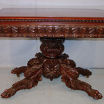 Federal mahogany acanthus carved game table with solid carving to the base top to bottom. Image courtesy of Stevens Auction Co.