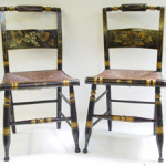 A pair of Hitchcock chairs with stenciled decoration. Image courtesy of LiveAuctioneers Archive and Estates Unlimited.