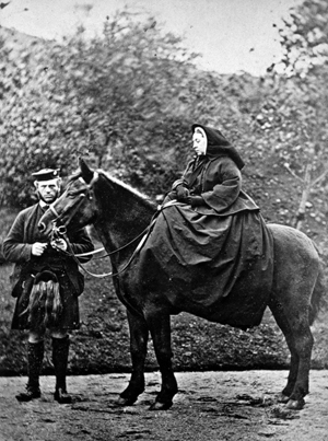 An 1863 photo of Queen Victoria on 'Fyvie' with John Brown at Balmoral. Image courtesy of Wikimedia Commons.